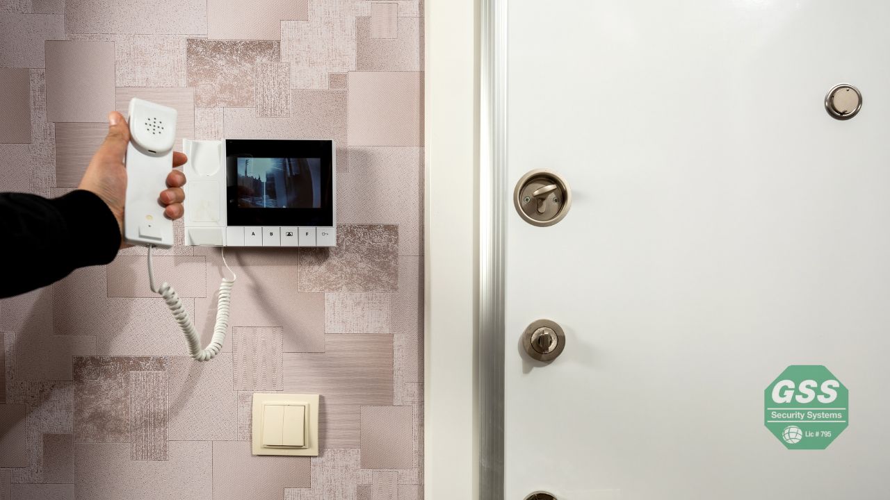 A father ensuring his home is secure with Globelink's smart emergency tools.