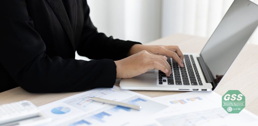 Globelink Systems professional conducting a home security assessment.