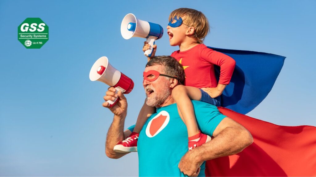 A father unwrapping a home security device on Father’s Day, surrounded by his joyful family in a cozy home setting.