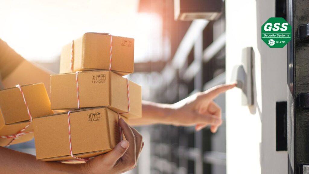 Security camera monitoring package delivery at a front door, ensuring the safety of deliveries.