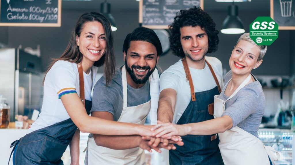 A small business with visible security systems such as cameras, alarms, and access controls protecting its premises.